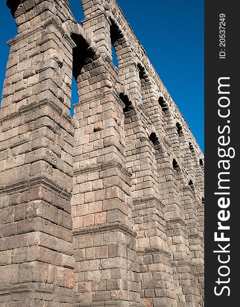 Evening view of Roman aqueduct of Segovia, Spain