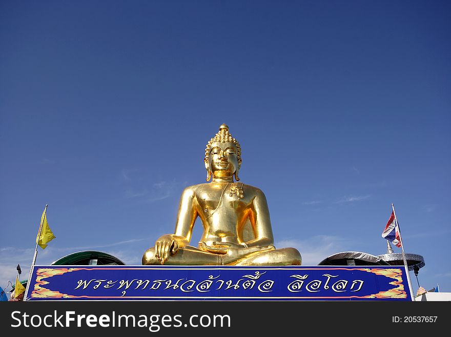 Big golden buddha with blue sky, Chiangrai province, Thailand.