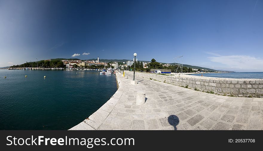 Panoramic view on the Crikvenica waterfront, port and the sea. Panoramic view on the Crikvenica waterfront, port and the sea