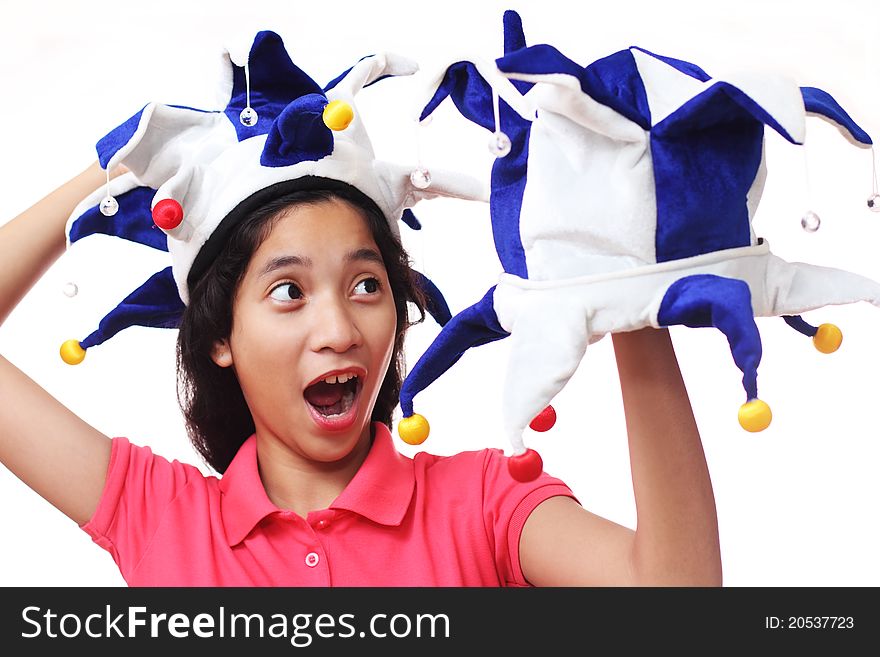 Young lady having fun with clown hats