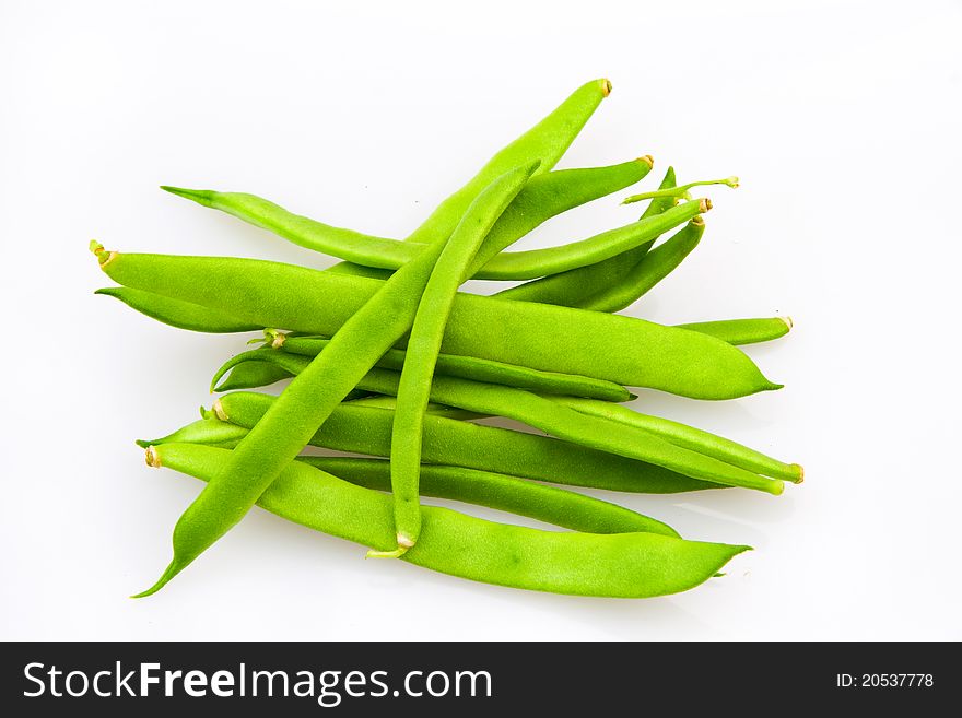 Bunch of green beans isolated on white.