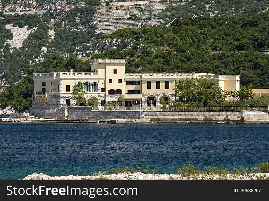 Old yellow renovated villa on the waterfront of Kraljevica with the park. Old yellow renovated villa on the waterfront of Kraljevica with the park