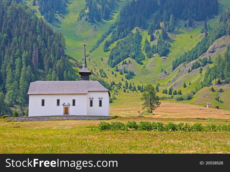 Beautiful church in alpine landscape