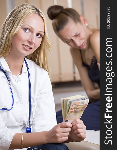 Payment for treatment - doctor holding money from ill patient in background. Payment for treatment - doctor holding money from ill patient in background