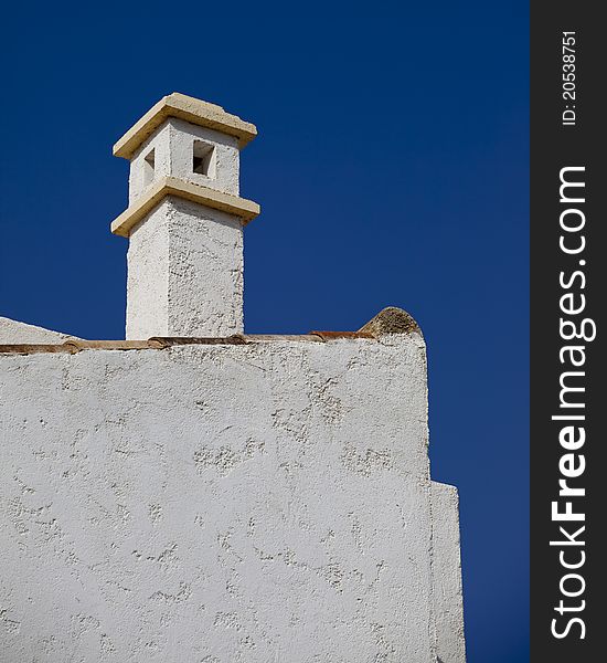 A distinctive white painted Spanish chimney. A distinctive white painted Spanish chimney