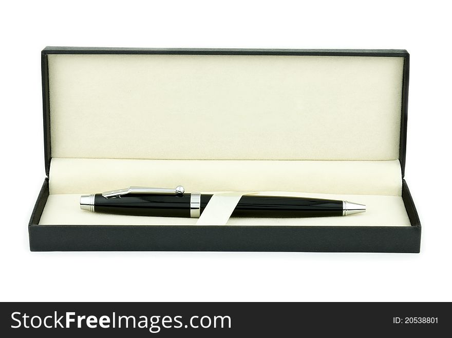 A pen in a gift box isolated on white. A pen in a gift box isolated on white