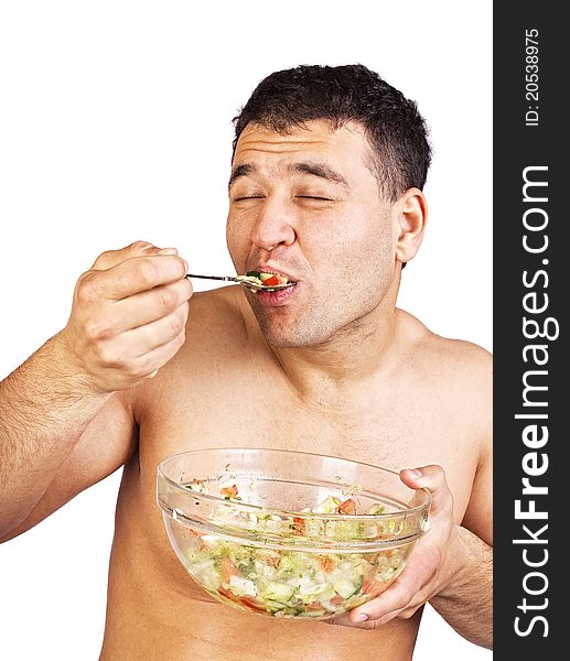 Young men eating salad close up shoot. Young men eating salad close up shoot