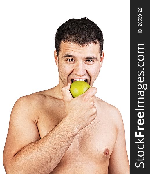 Happy man eating green apple. Happy man eating green apple