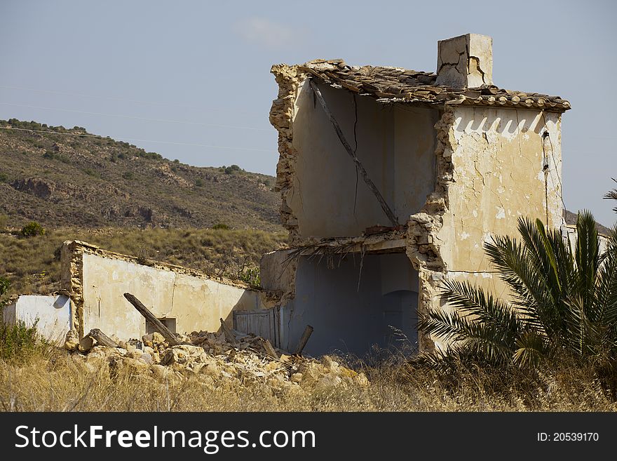 The shell of a ruined Spanish house