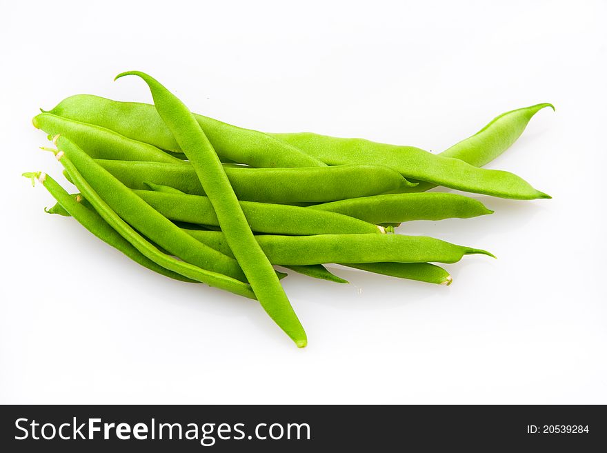 Bunch of green beans isolated on white.