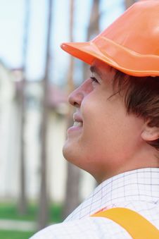Young Worker Outdoors Looking At The Building Royalty Free Stock Images