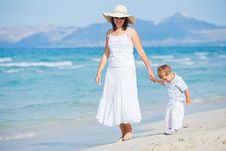 Young Mother With Her Son On Beach Vacation Royalty Free Stock Photography Young Mother With Her Son On Beach Vacation Royalty Free Stock Photography