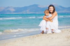 Young Mother With Her Son On Beach Vacation Stock Photo Young Mother With Her Son On Beach Vacation Stock Photo