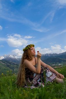 Beautiful Woman Eating Strawberries On Blue Sky Ba Stock Photos
