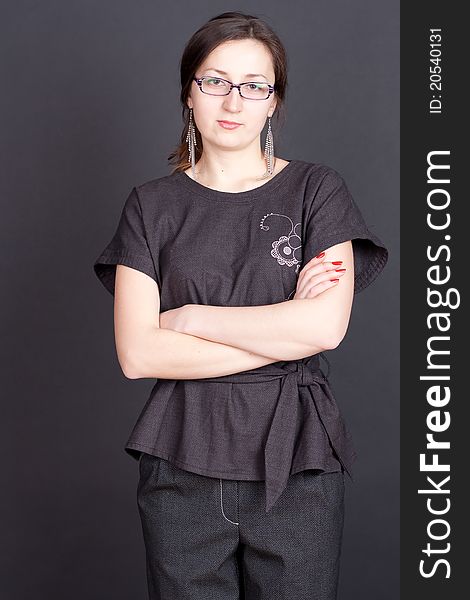 Business woman in glasses studio photography
