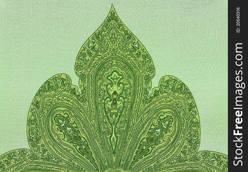 Green oriental ornamented textile scan.