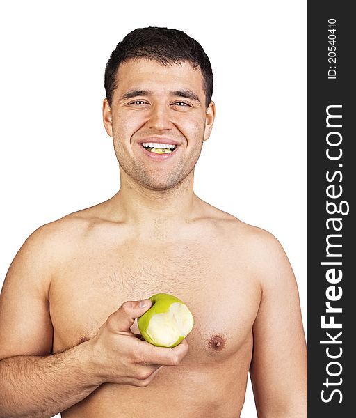 Happy man eating green apple. Happy man eating green apple