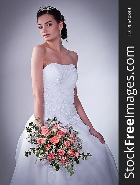 Women in wedding dress with flowers