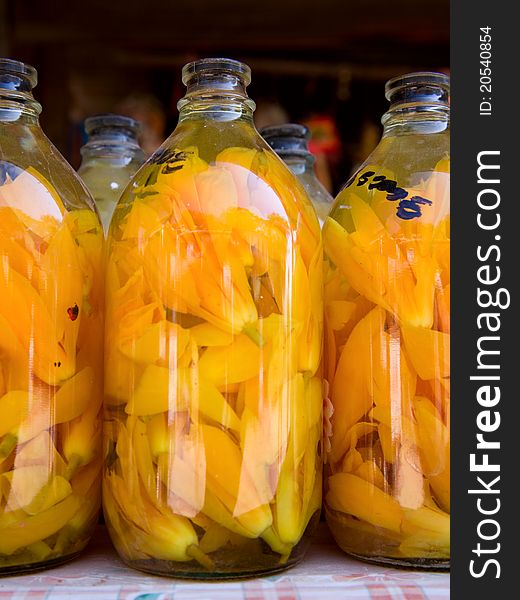 Bud of yellow flowers  in transparent glass bottle. Bud of yellow flowers  in transparent glass bottle