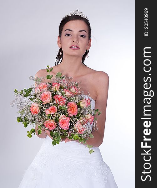 Women in wedding dress with flowers
