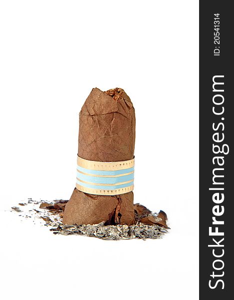 On a photo the cigarette-end of cigar is presented on a white background. On a photo the cigarette-end of cigar is presented on a white background