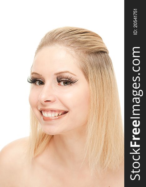 Smiling blond with lengthen eyelashes