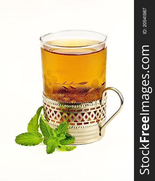 A cup of healthy tea with fresh mint