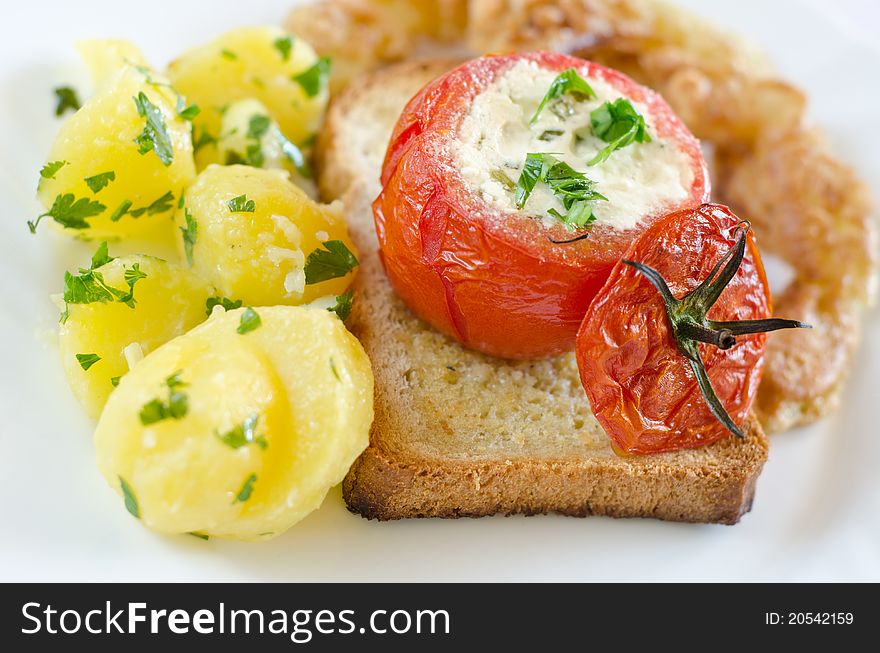Toast wiht fresh vegetables like potato and tomato. Toast wiht fresh vegetables like potato and tomato