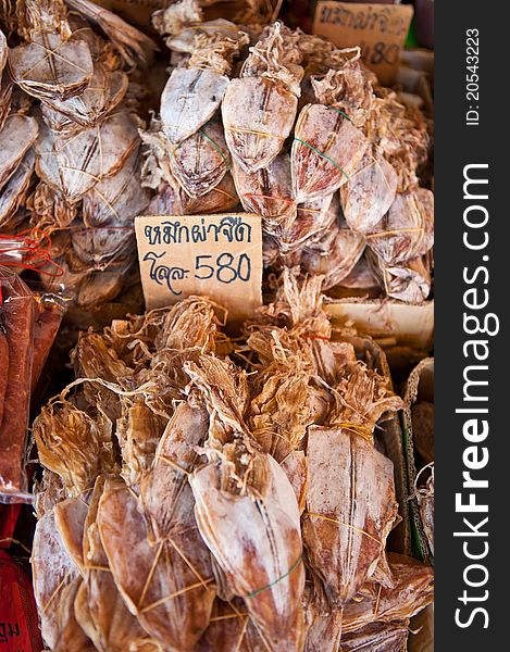 Drief squid for sale at a market in south-east Asia. Drief squid for sale at a market in south-east Asia