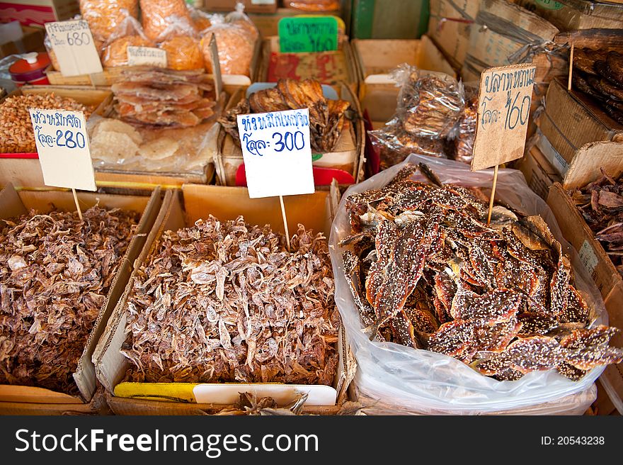 Drief squid for sale at a market in south-east Asia. Drief squid for sale at a market in south-east Asia