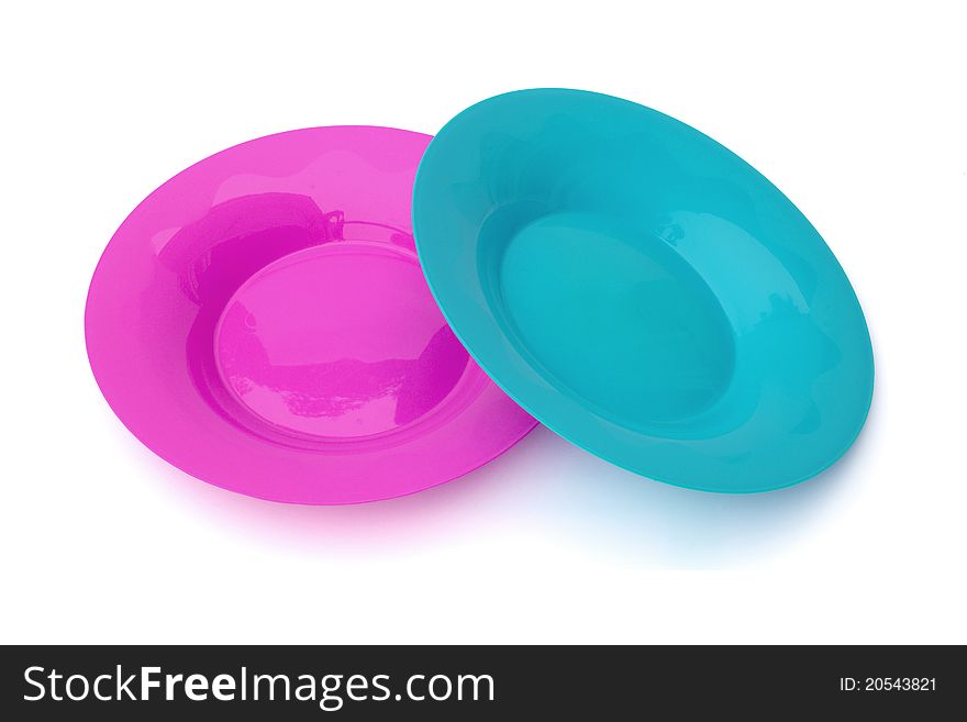 Two of color plastic dish on white background.