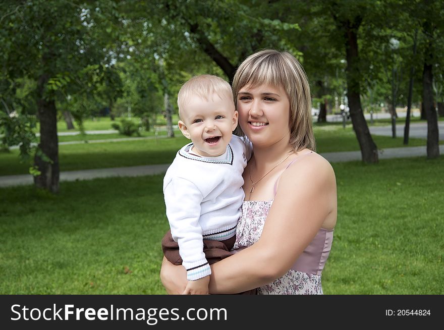 Mom And Baby In Park