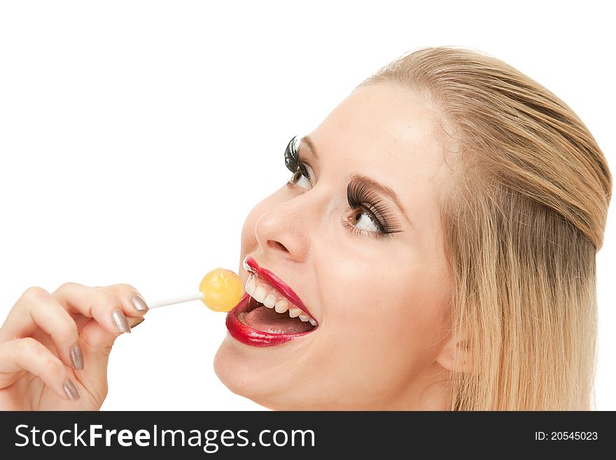 Portrait of attractive Blond woman with lengthen eyelashes with lollipop, isolated on white. Portrait of attractive Blond woman with lengthen eyelashes with lollipop, isolated on white