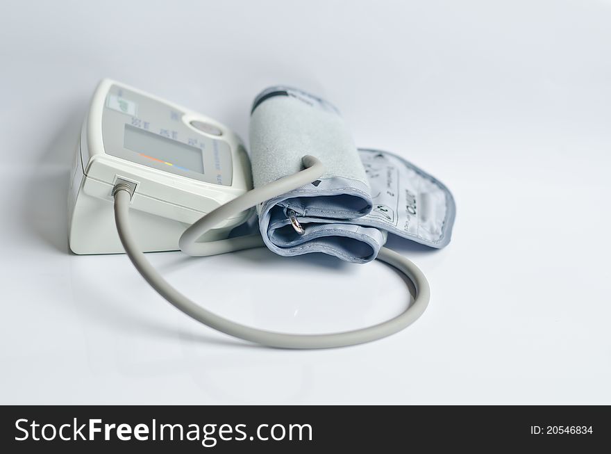 Digital Blood pressure monitor with gray background