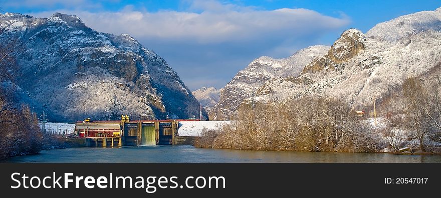 Winter time, mountain landscape with blue ski