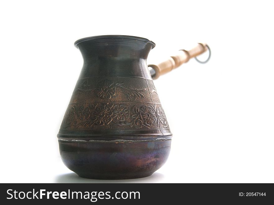 A vintage coffee-pot shown on white background