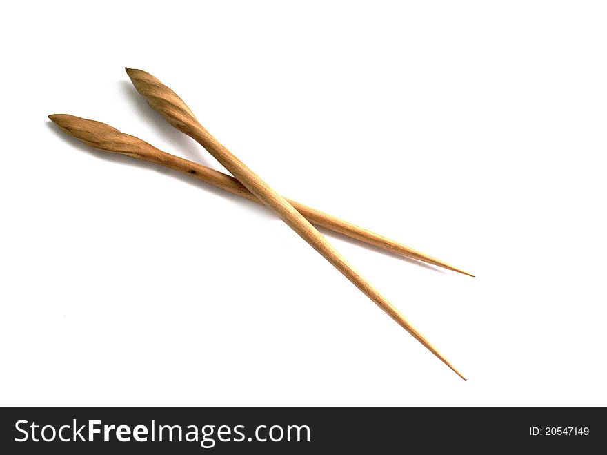 Hair wooden sticks on white background. Hair wooden sticks on white background