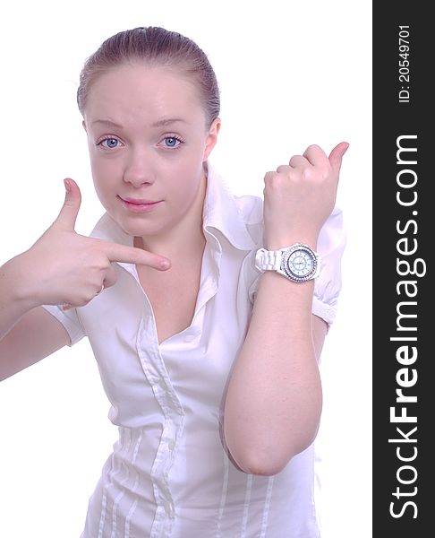 Young businesswoman pointing to her watch. Young businesswoman pointing to her watch