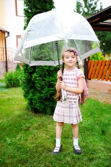 Little Schoolgirl With Backpack And Umbrella Royalty Free Stock Images Little Schoolgirl With Backpack And Umbrella Royalty Free Stock Images