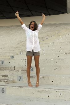 Beautiful Girl Jumping In An Empty Stadium Stock Photos
