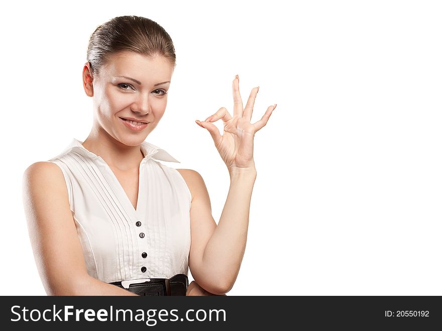 Beautiful young woman signaling ok. Isolated over white background