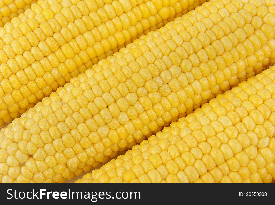 Three ears of corn. Corn background.