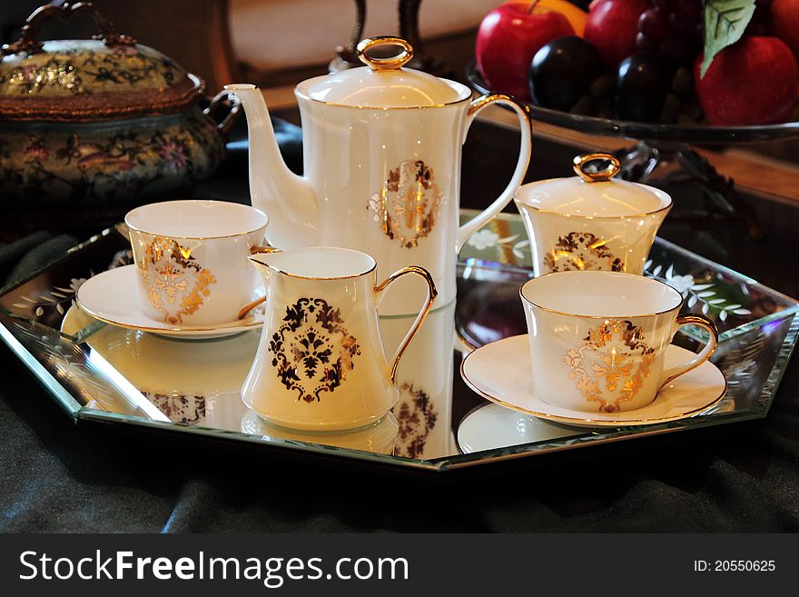 Image of tea set with beautiful Chinese painting/flower pattern on it. Image of tea set with beautiful Chinese painting/flower pattern on it.