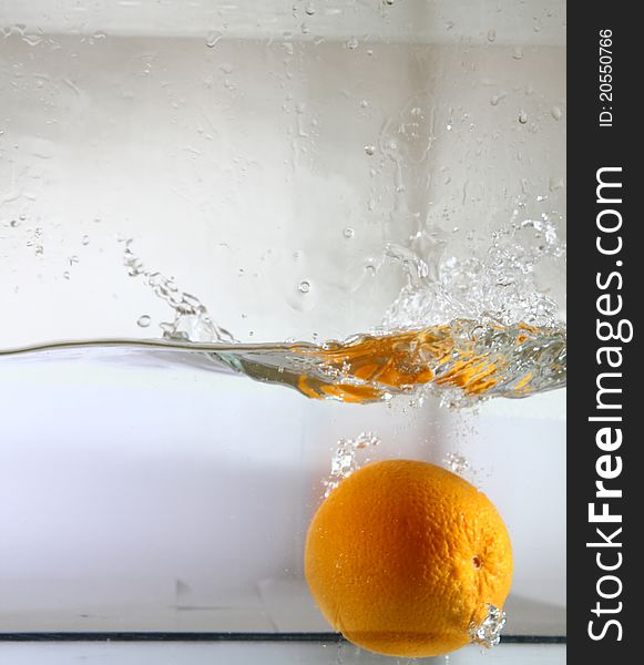 Orange Falling In Water