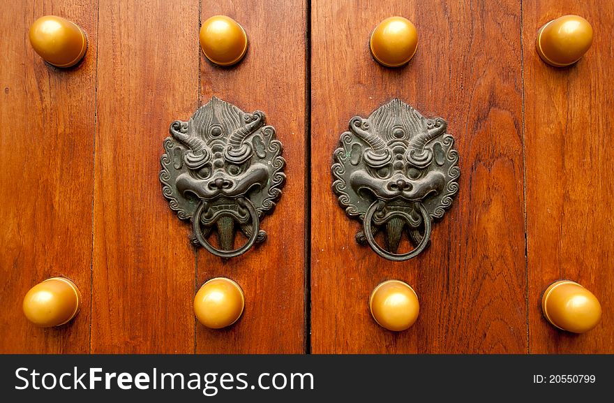 Chinese styles door with lion hand grip. Chinese styles door with lion hand grip