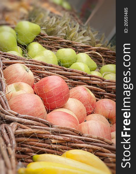 Ripe fruits and vegetables in baskets