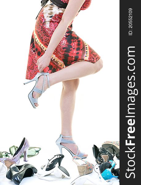 Young woman buying shoes addiction, isolated