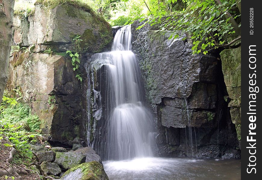 Medium sized waterfall near Matlock Derbyshire. Medium sized waterfall near Matlock Derbyshire.