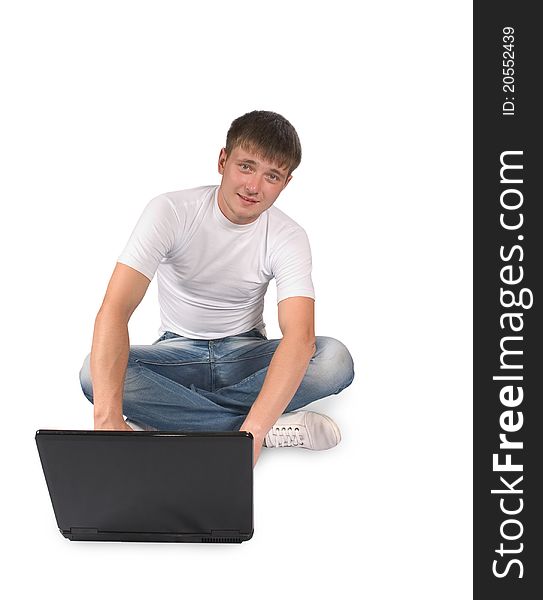 Young guy with the laptop on white