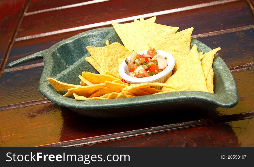 Tortilla chips with salsa dip